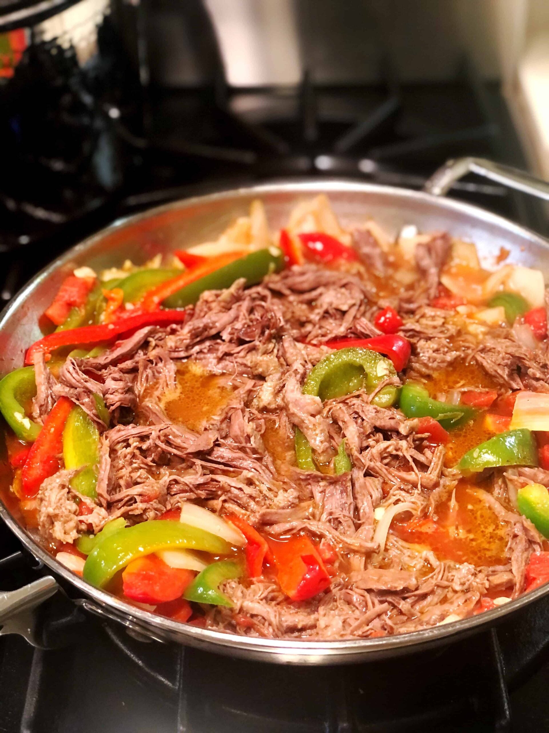 ropa vieja simmering in pan