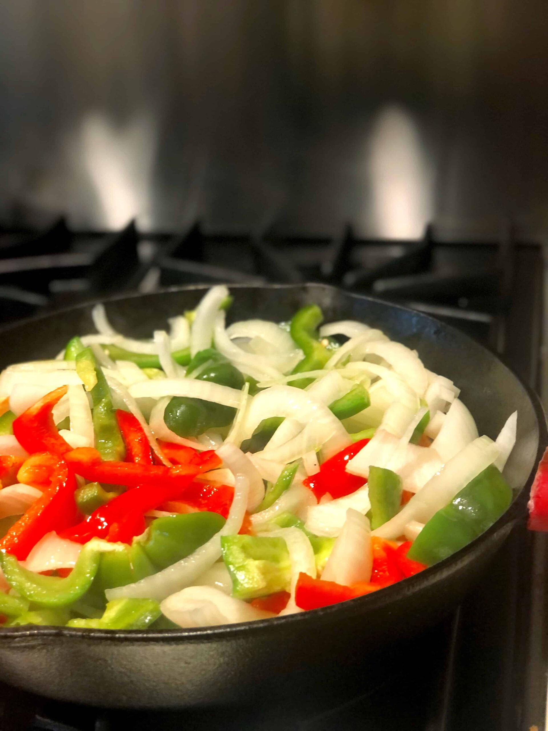 Fajitas in pan on stove.