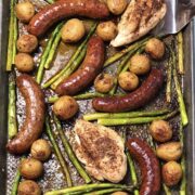 za'atar chicken and sausage on a sheet pan