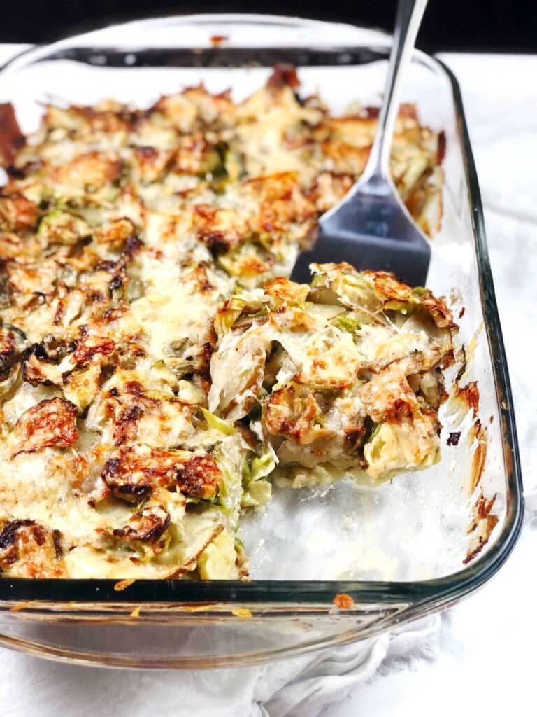 potato and brussels gratin with piece cut