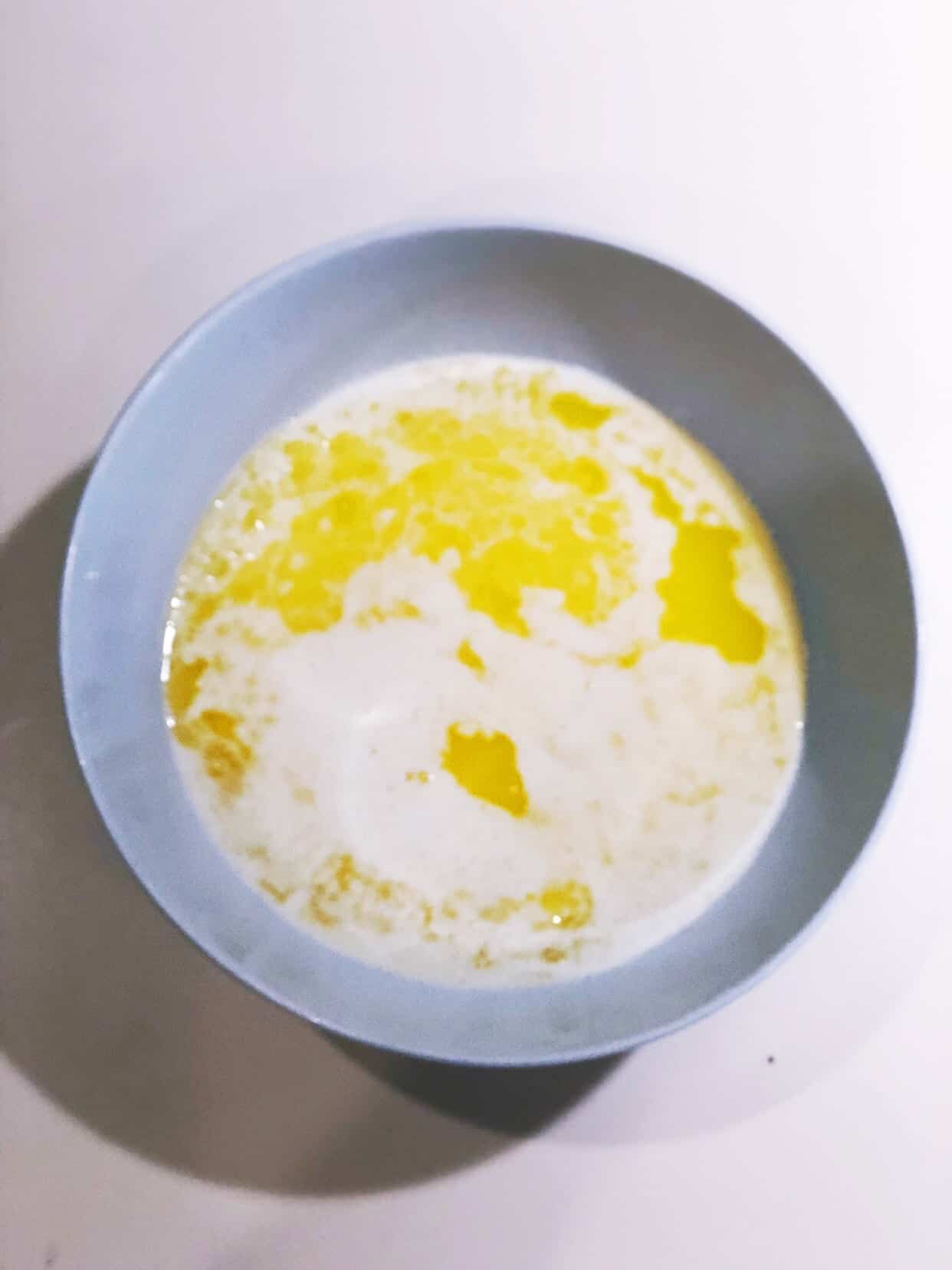 Melted cream and butter in bowl.