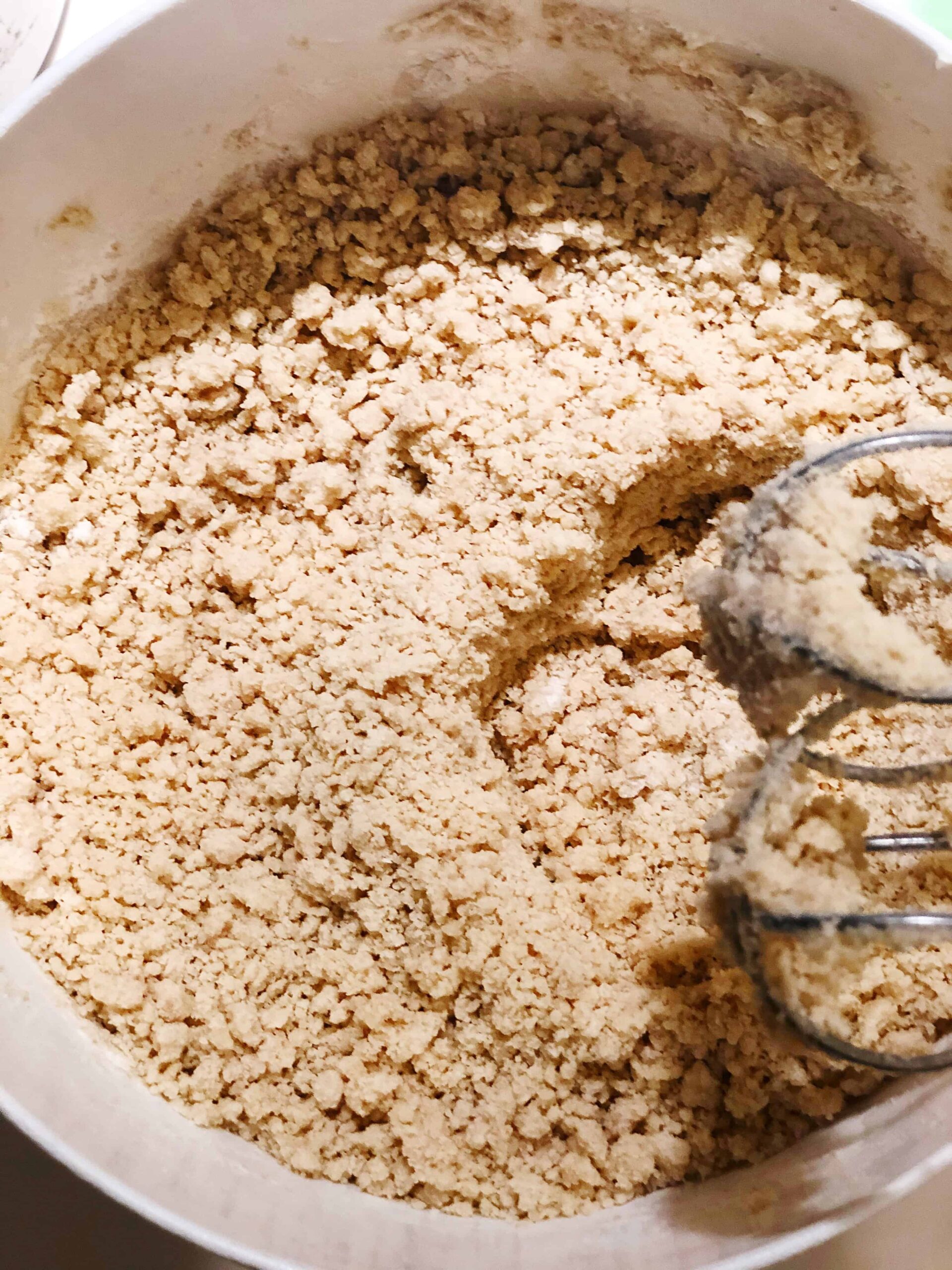 Flour added to butter and sugar