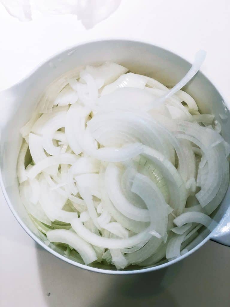 slicing onions thin for genovese sauce