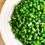 Closeup of Italian peas with garlic and parsley