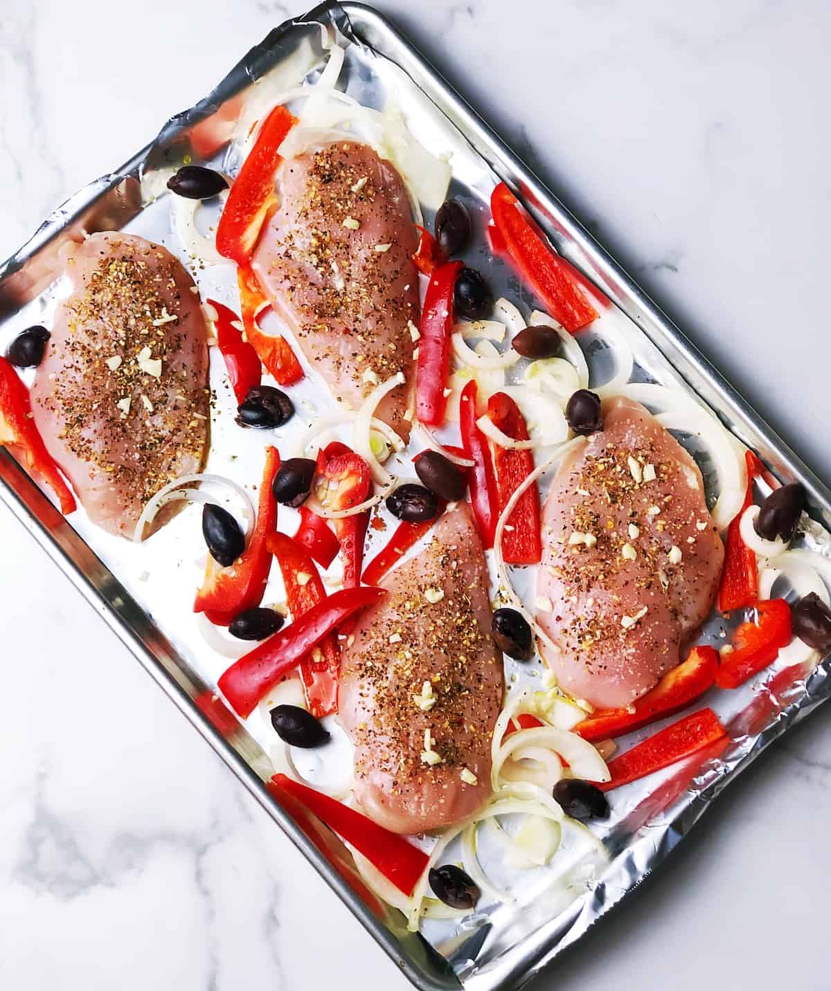 making baked greek chicken