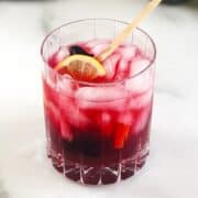 blackberry bramble in glass with stirrer