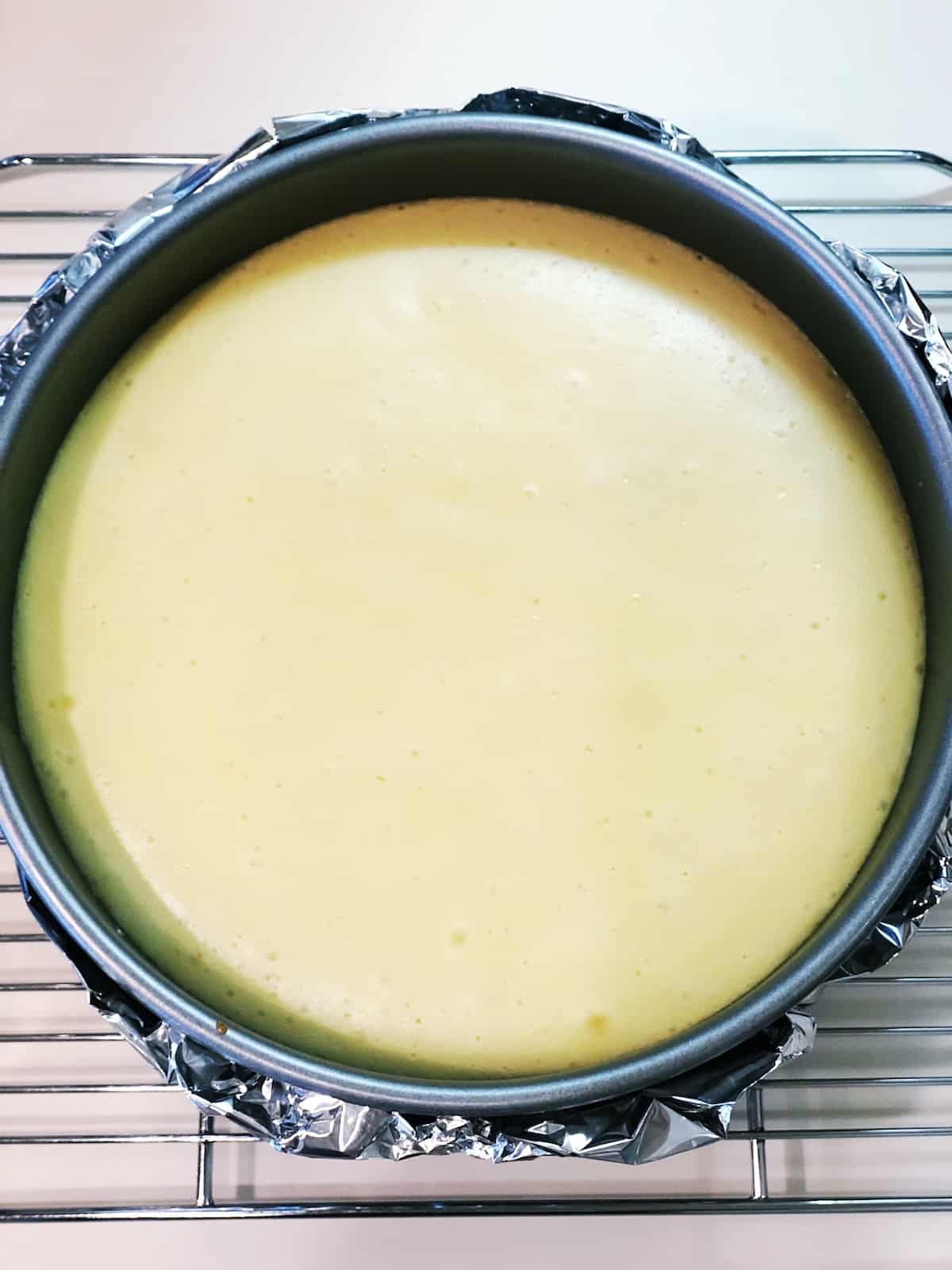 classic cheesecake cooling on rack