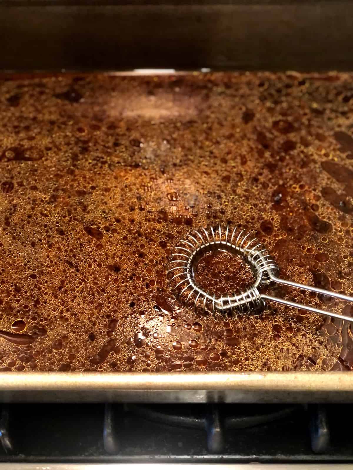 scraping down pan for au jus