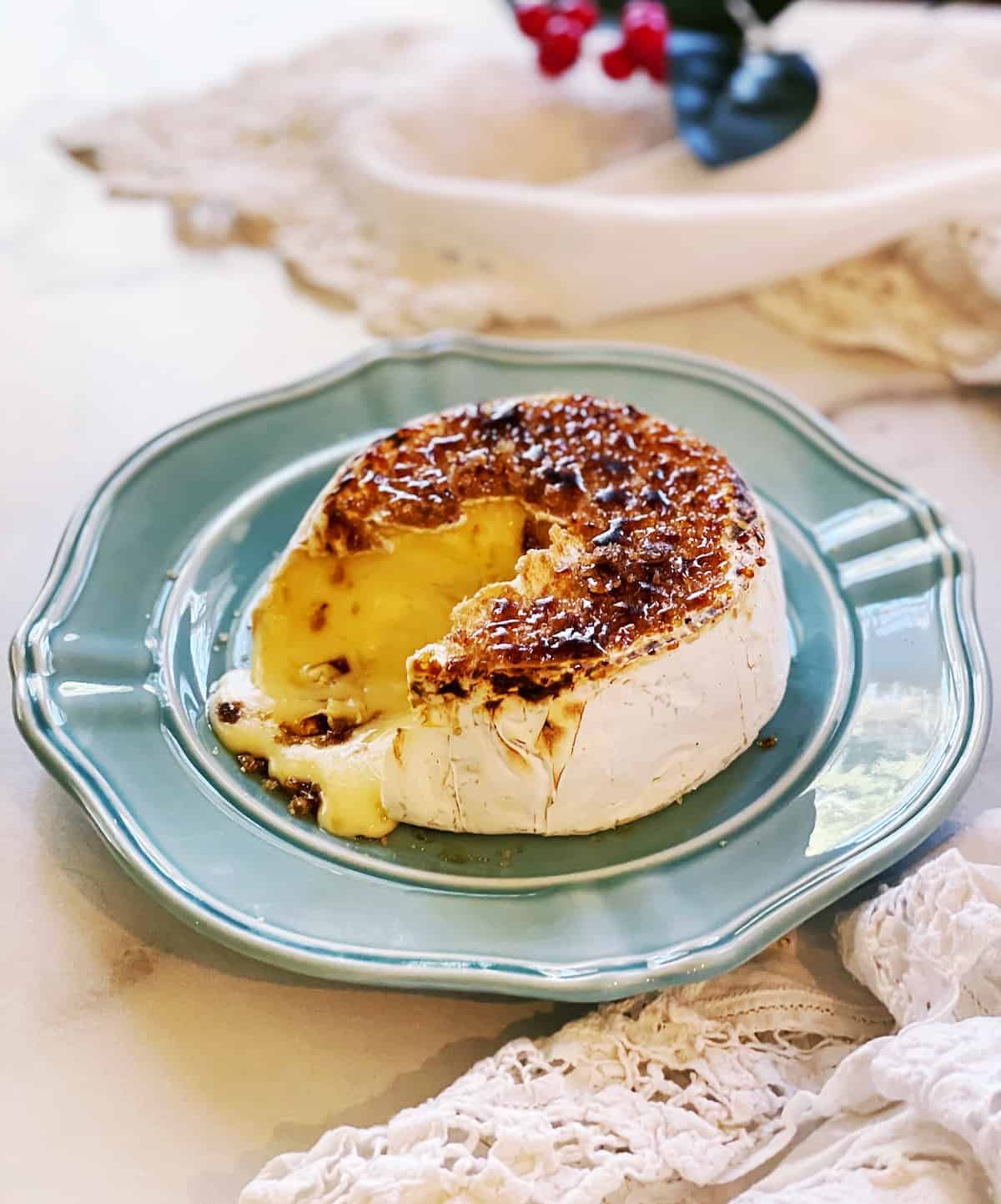 A plate with a piece of cheese on it.