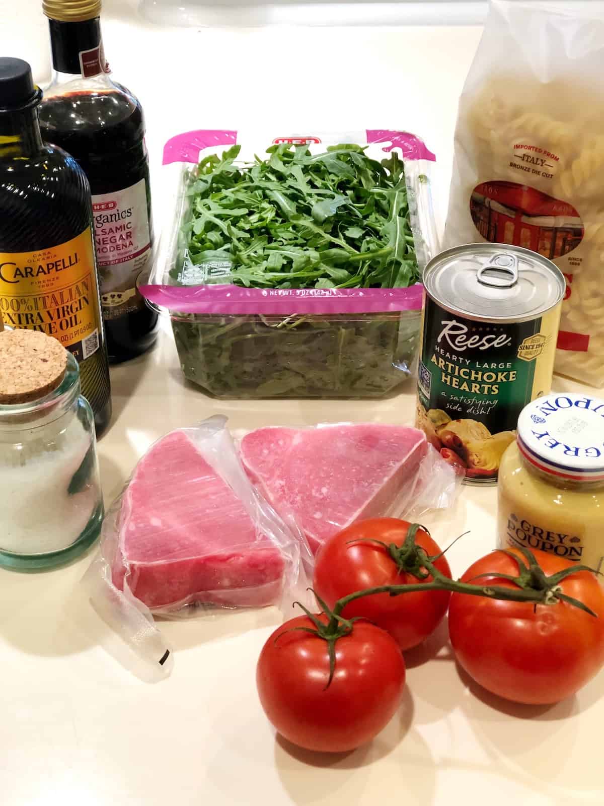 Tuna pasta salad ingredients on the ocunter