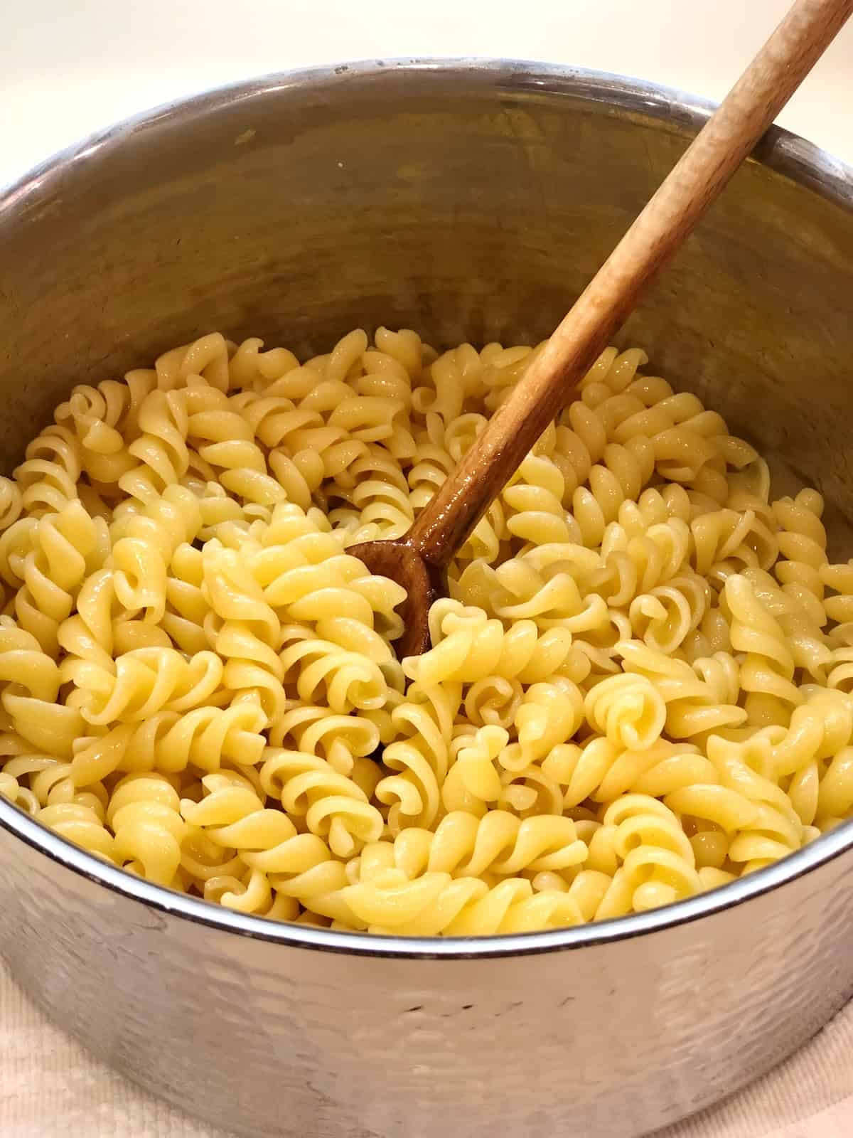 Corkscrew pasta in a pot for tuna pasta salad