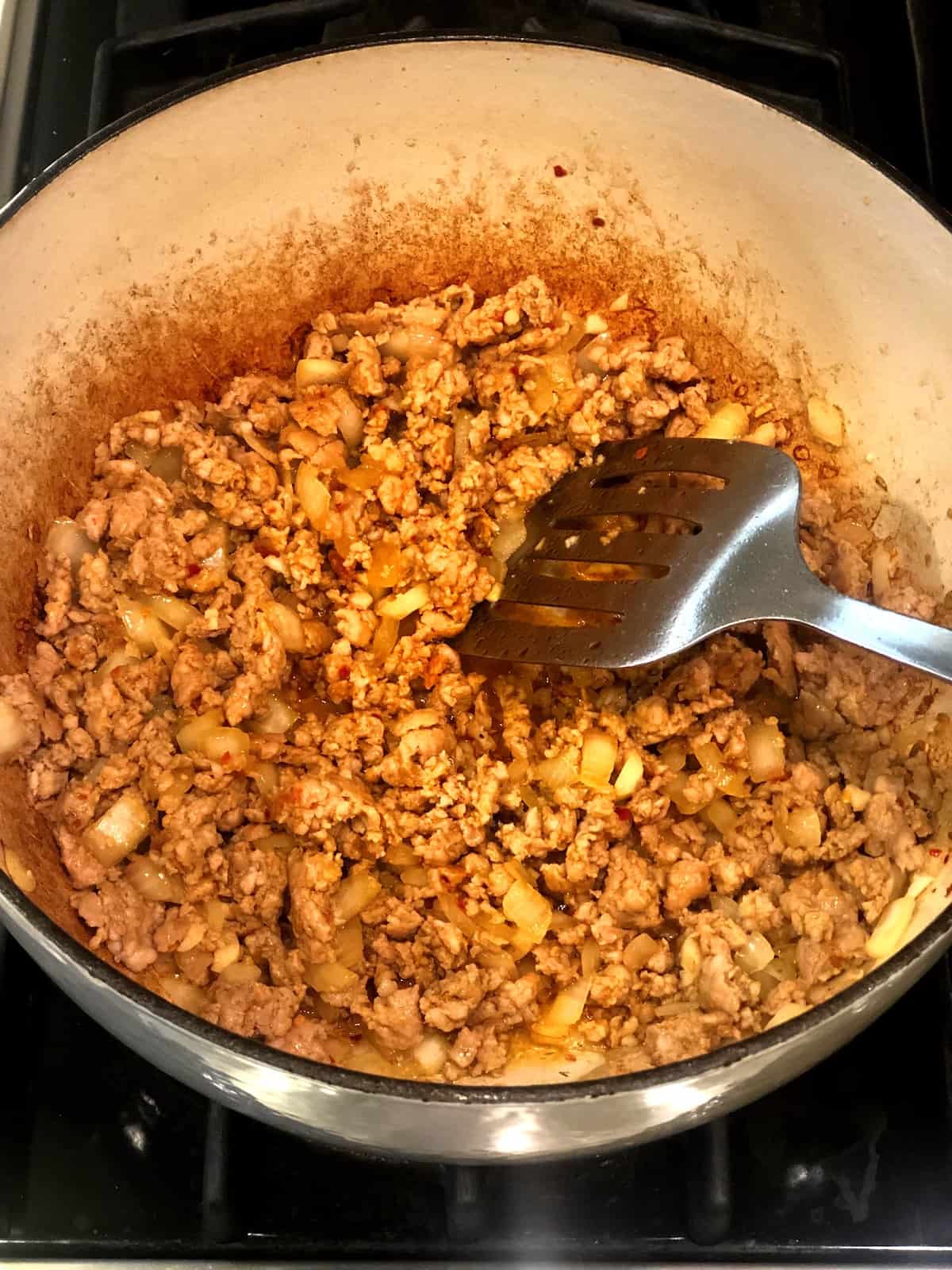 sausage black bean sweet potato soup cooking