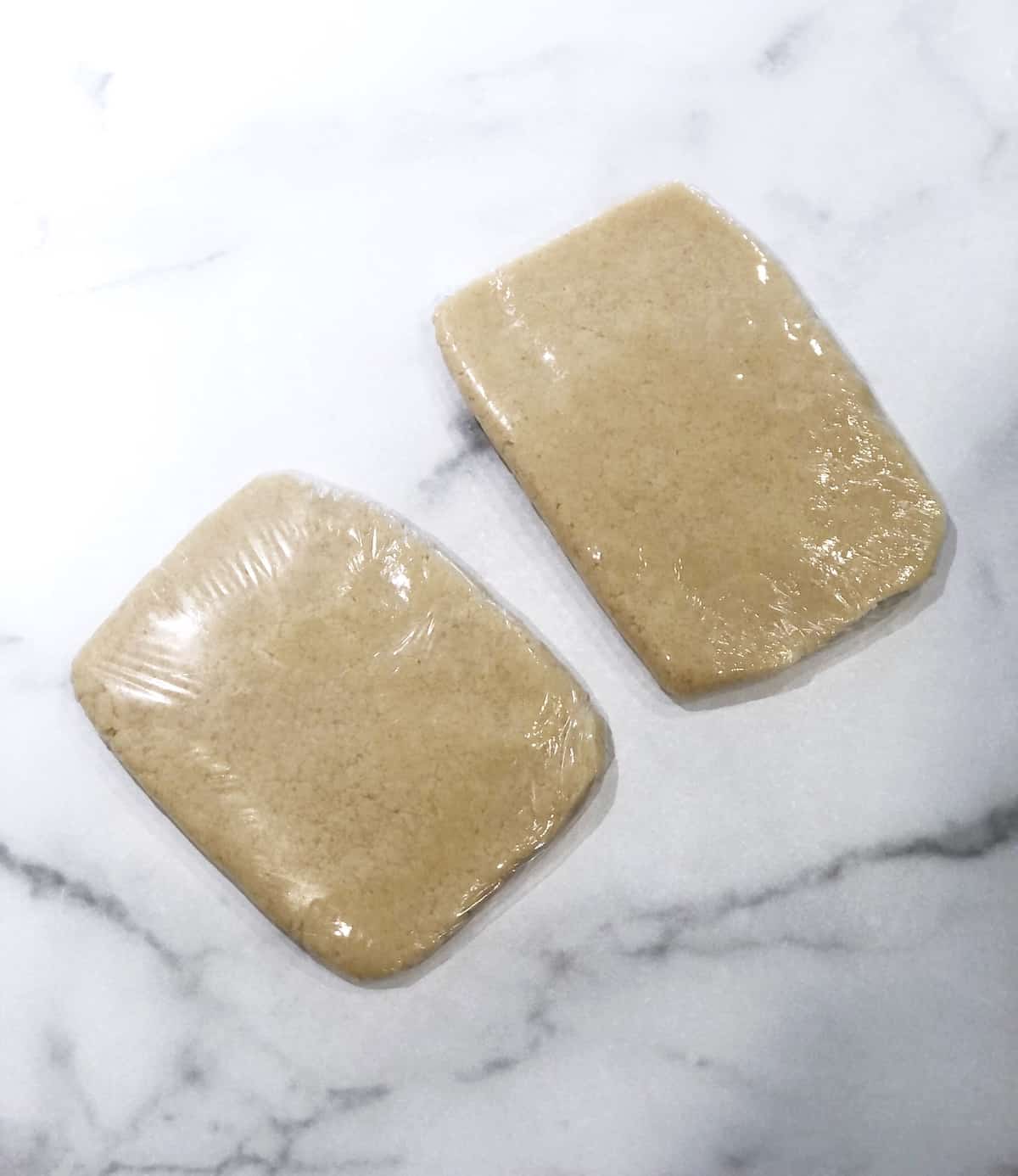 Cardamom shortbread dough wrapped.