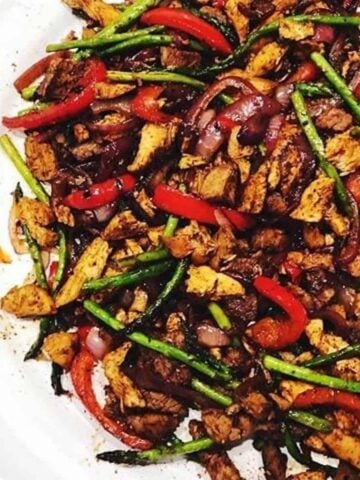 Cooked chicken fajitas on a plate.