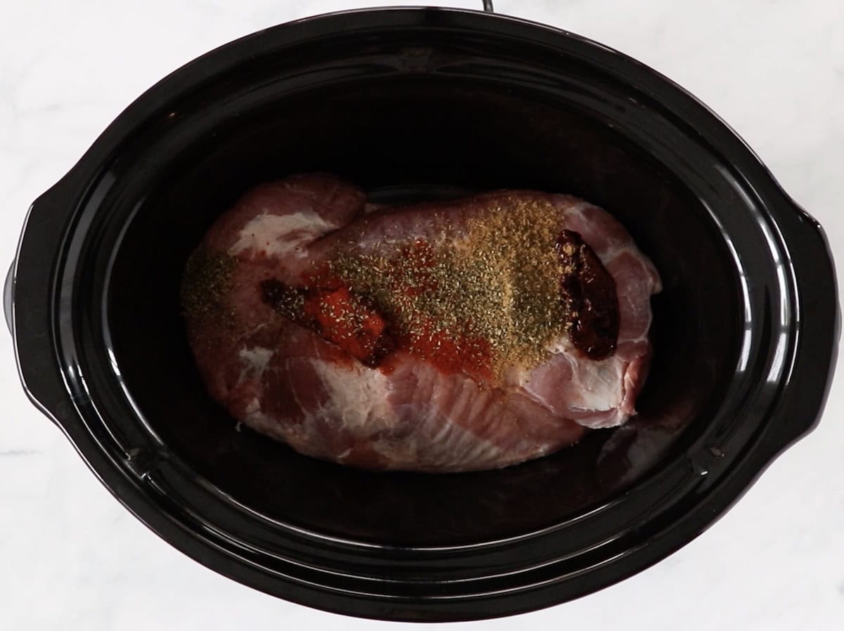 Pulled pork ingredients in the slow cooker.