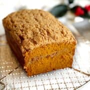 Pumpkin streusel bread on a cooling rack.