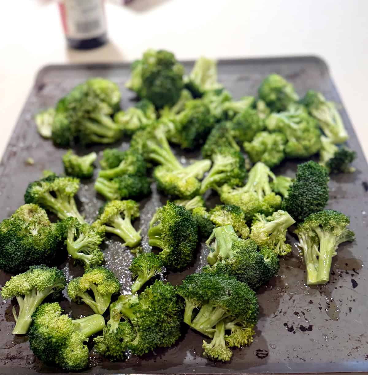 Preparing the charred broccoli.