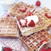 Belgian yeast waffles stacked with fresh berries.