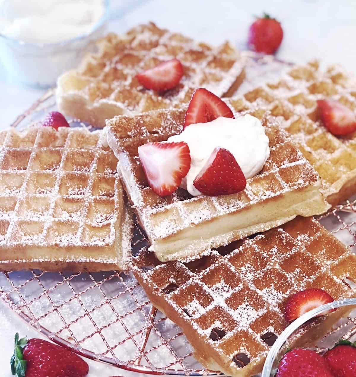 Belgian yeast waffles stacked with fresh berries.