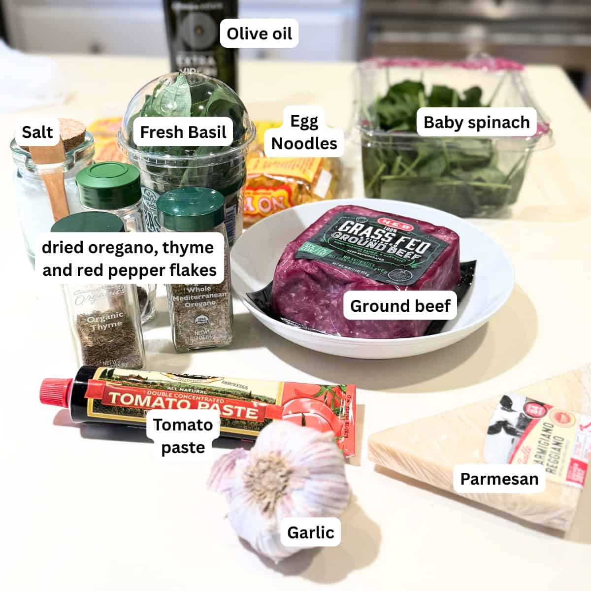 Italian herb burger ingredients on the counter.